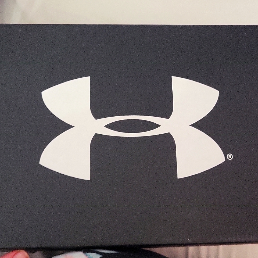 UA boys cleats,  brand new, never worn